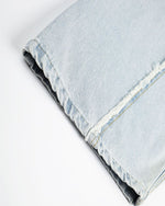 Ripped and frayed jeans