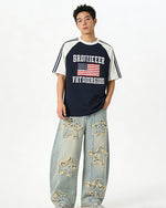Distressed washed jeans