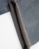 Distressed straight jeans