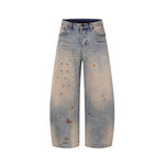 Spray-painted distressed jeans