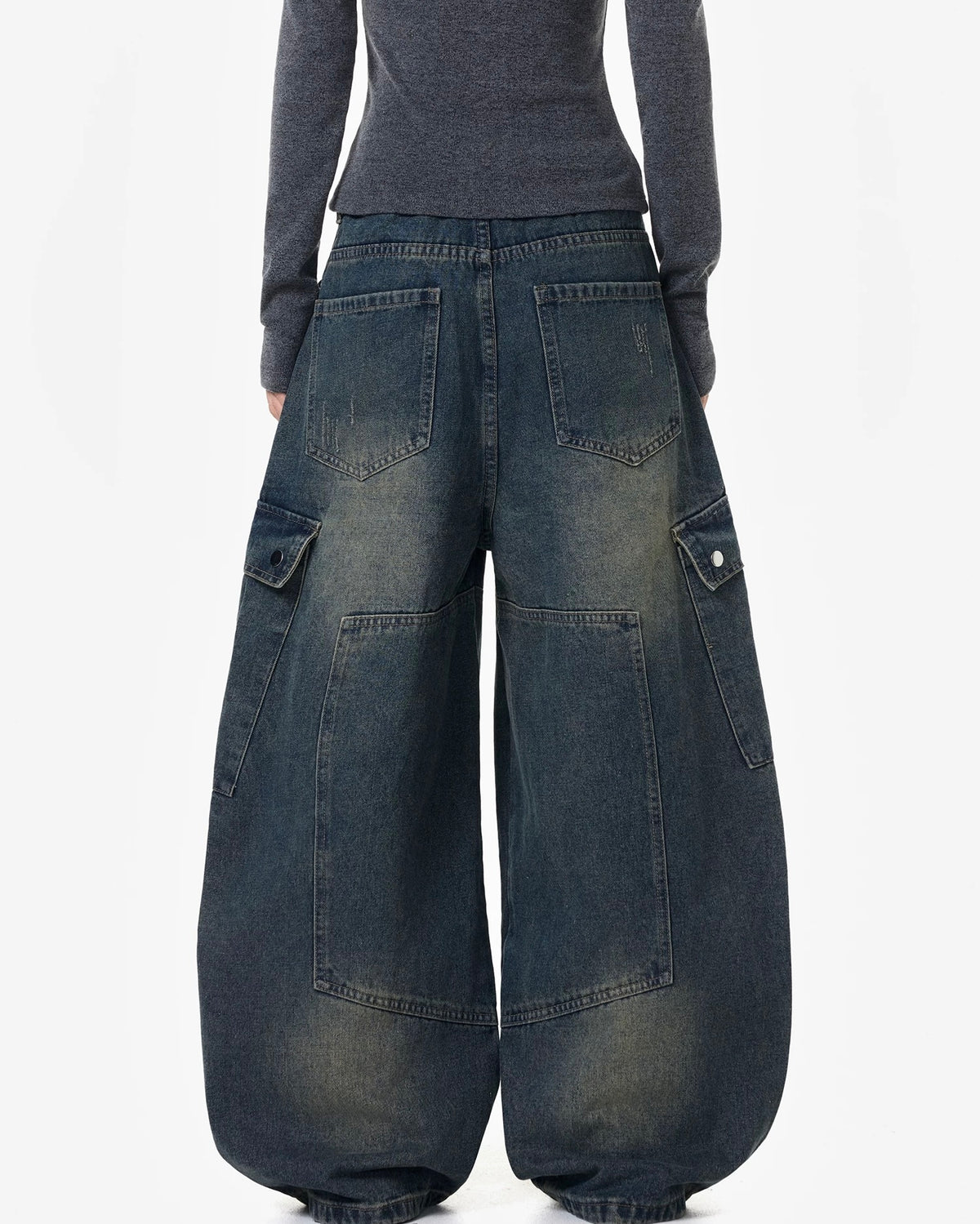 Distressed multi-pocket jeans