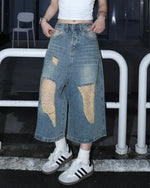 Vintage distressed denim cropped shorts