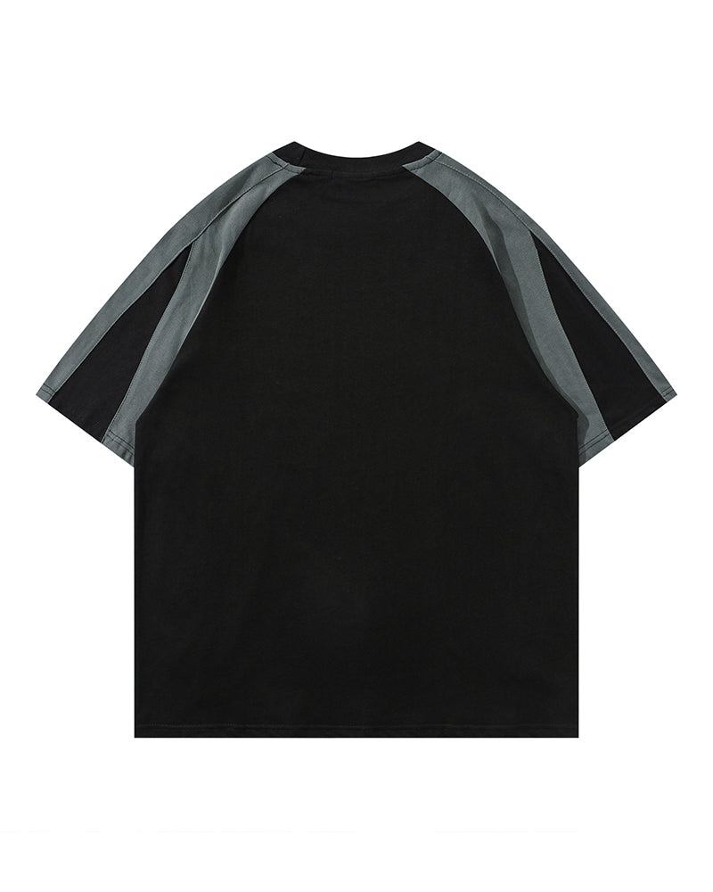 루즈한 반소매와 대비되는 레트로 패치워크