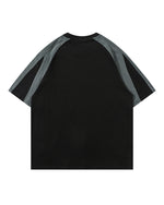 루즈한 반소매와 대비되는 레트로 패치워크