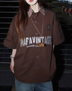 Embroidered contrast plaid short-sleeved shirt