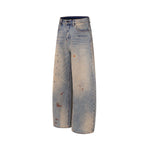 Spray-painted distressed jeans