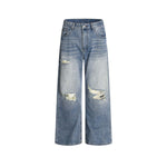 Distressed straight jeans