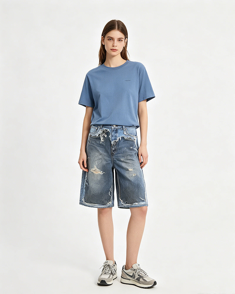 ダメージ加工のパッチワークデニムショートパンツ