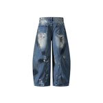 Distressed gradient jeans