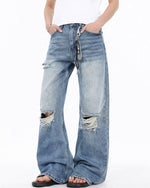 Distressed straight jeans