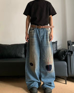 Distressed straight jeans