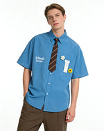 Short-sleeved shirt with small embroidered flowers