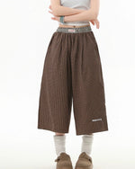 Panelled contrast plaid shorts