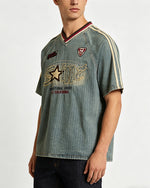 Distressed denim short-sleeved shirt with appliqué