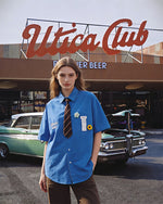 Short-sleeved shirt with small embroidered flowers
