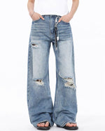 Distressed straight jeans