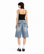 Studded distressed capri pants