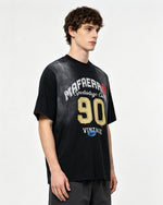 Embroidered distressed short-sleeved shirt