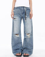 Distressed straight jeans