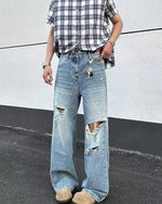 Distressed washed straight jeans