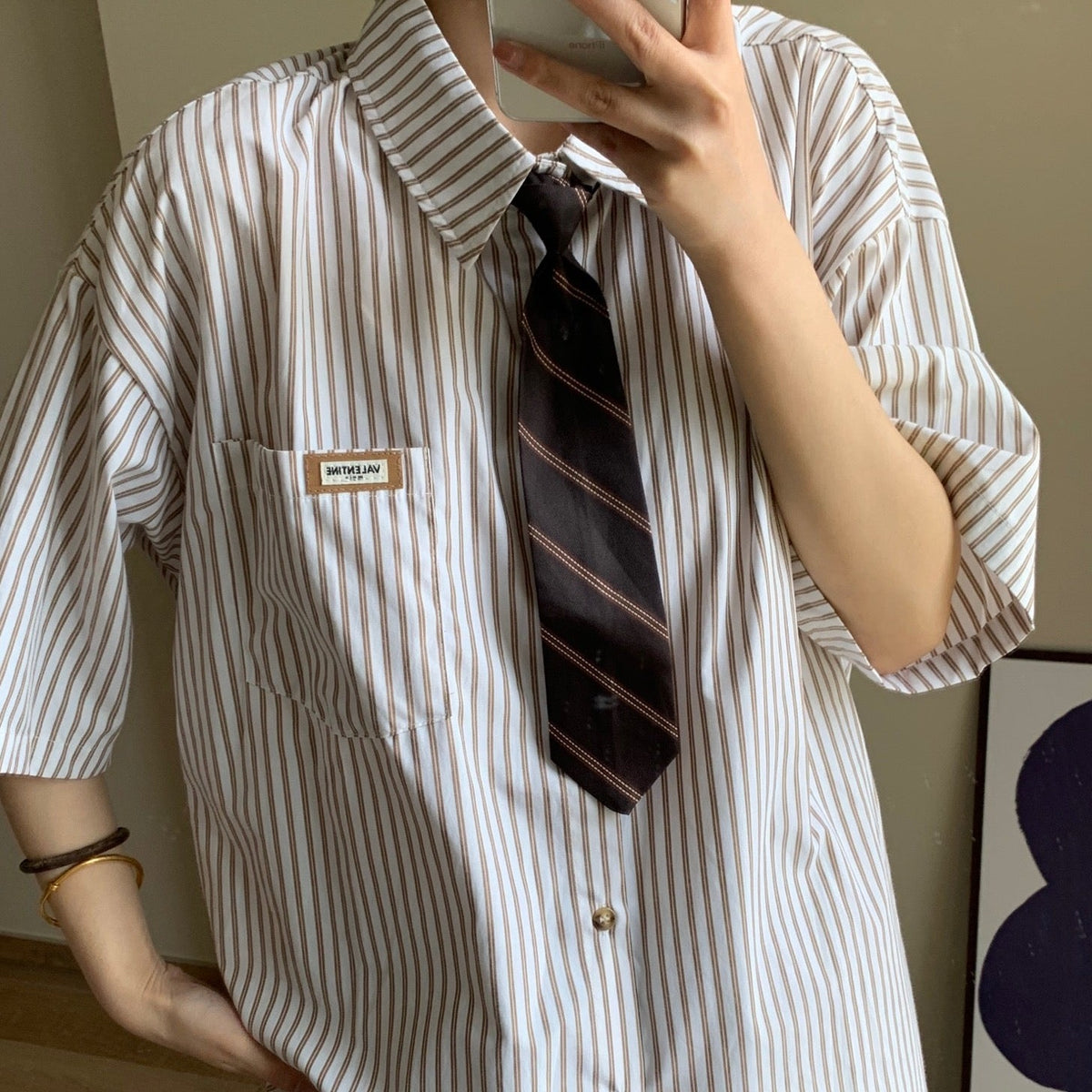 Striped shirt with vintage tie