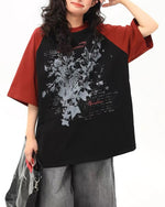 대비되는 색상의 꽃무늬 반팔