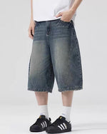 Paneled distressed cropped shorts