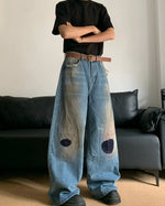 Distressed straight jeans